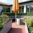 06-Hochbeete,-Rundbank-und-Wassertrog Caritas Werkstatt Dachau , Planung Christian Grote Landschaftsarchitekt gründesign